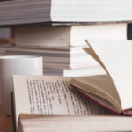 various-books-near-mug